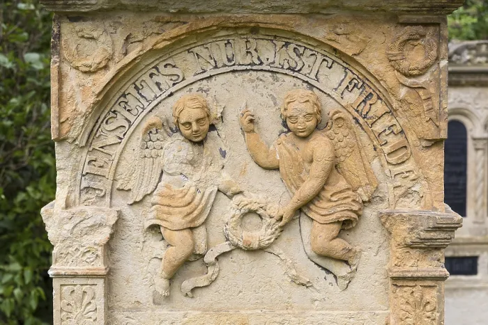 Framed Print : 2 angel figures in sandstone on a historic gravestone Framed Print : 2 angel figures in sandstone on a historic gravestone