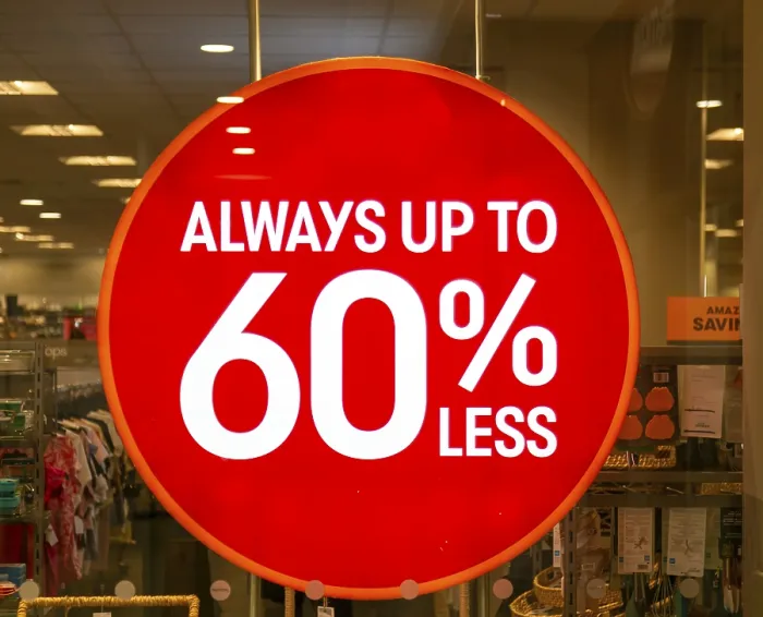 Framed Print : Always up to 60% less sale sign in TK Maxx shop window