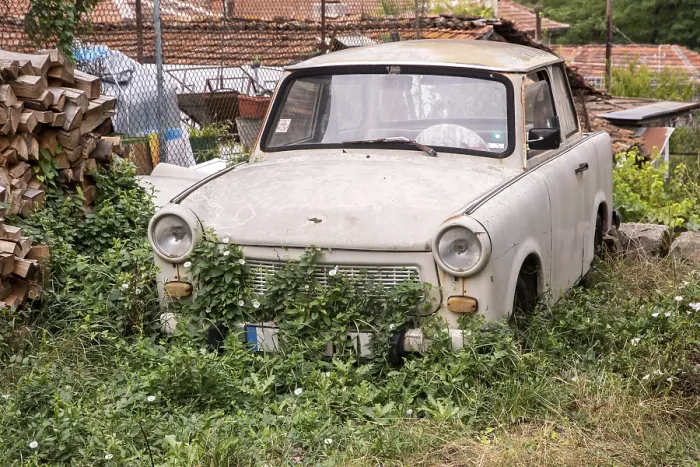 Framed Print : Abandoned old neglected Trabant car in eastern Europe village Framed Print : Abandoned old neglected Trabant car in eastern Europe village