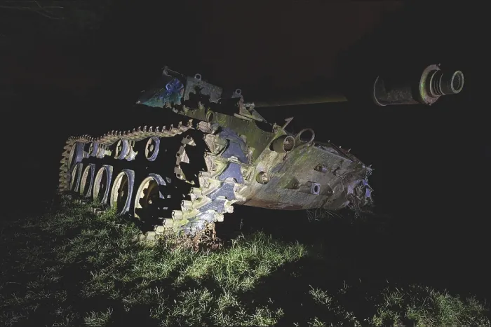 Framed Print : An abandoned tank with graffiti in the dark forest