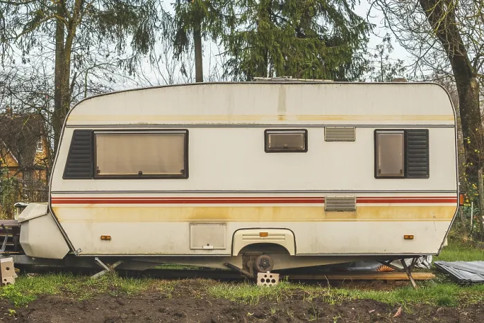 Framed Print : Abandoned vintage caravan / camper Van parked at the garden Framed Print : Abandoned vintage caravan / camper Van parked at the garden