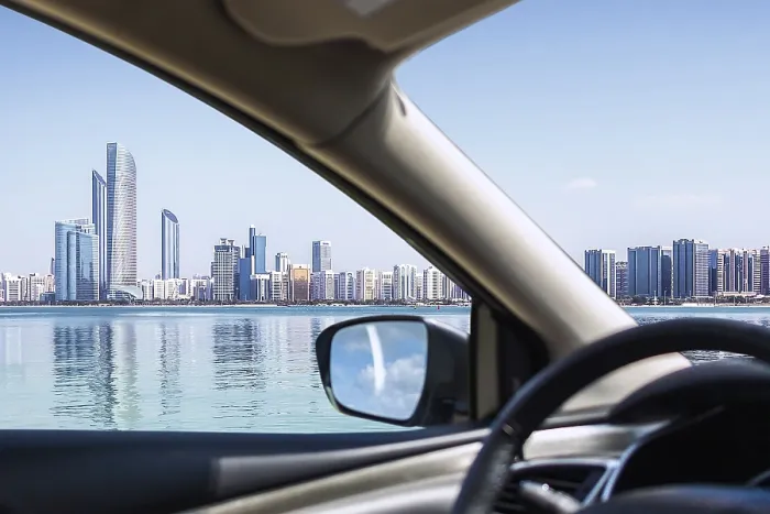 Framed Print : Abu Dhabi Skyline with water and blue sky