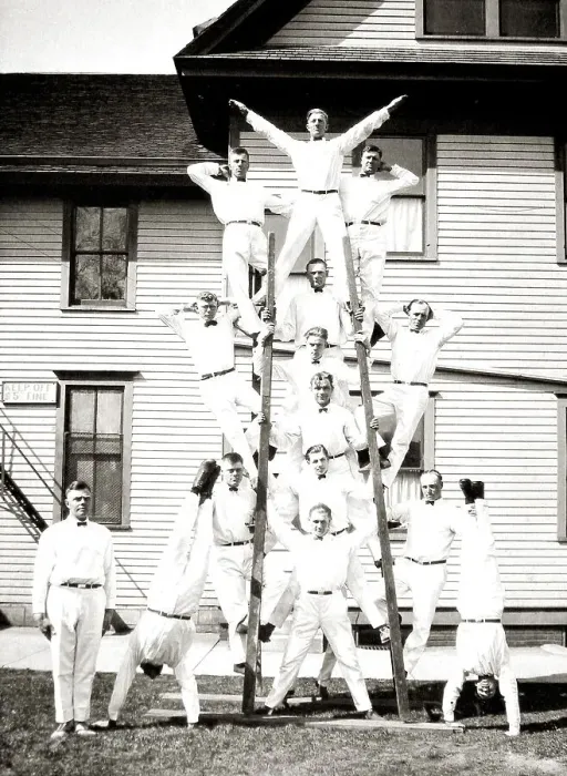 Framed Print : Acrobats with two ladders, ca. 1920