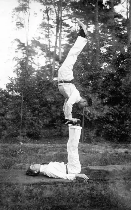 Framed Print : Two acrobats training on the meadow Framed Print : Two acrobats training on the meadow