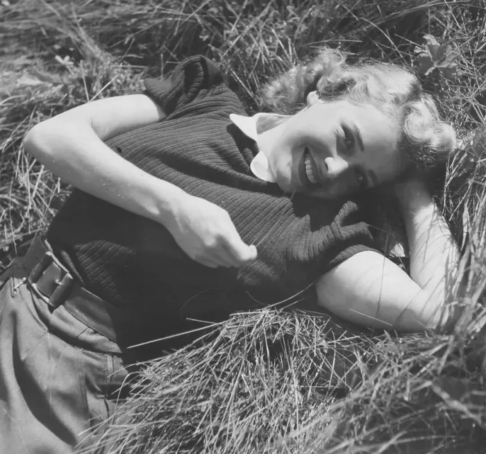 Framed Print : Actress in the 1940s. Swedish actress Agneta Lagerfelt pictured a summer day, lying in the grass looking into the camera. Sweden 1942 Kristoffersson