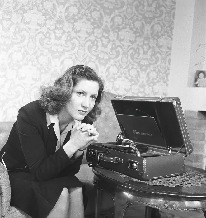 Framed Print : The actress Barbro Kollberg at a gramophone