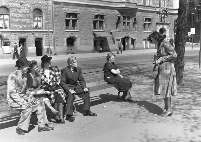 Framed Print : Actress Gaby Stenberg takes a picture of her friends with her camera 1940