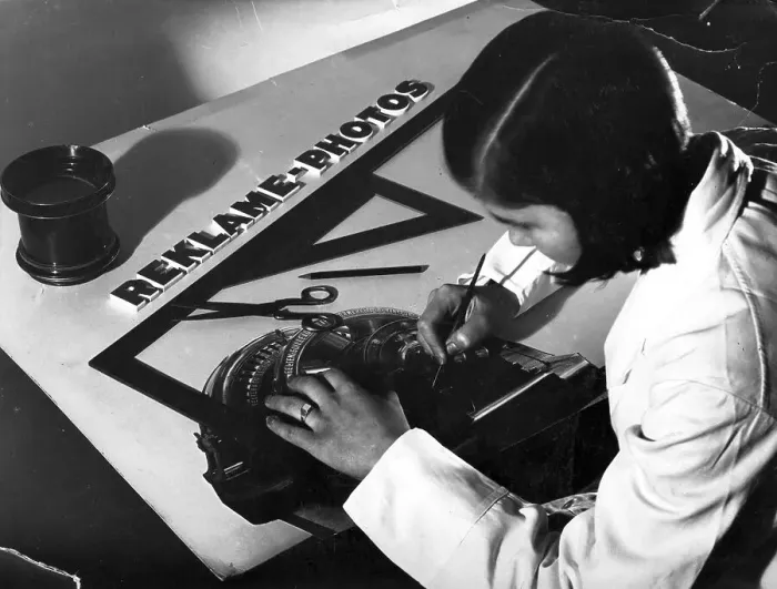Framed Print : Advertising, graphic artist at work