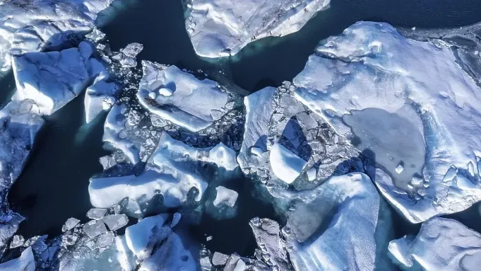 Framed Print : Aerial drone view of floating icebergs in Jokulsarlon glacier lagoon in Iceland
