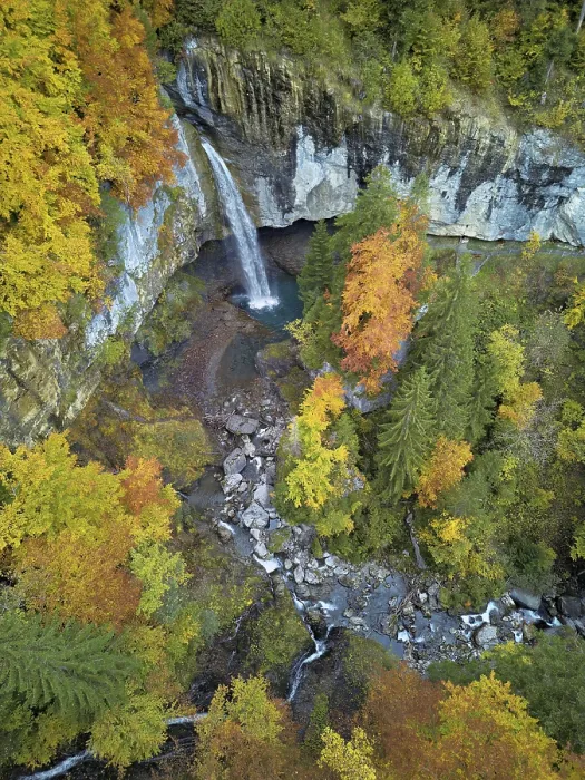 Framed Print : Aerial view of Berglistuber waterfall in autumn-colored surroundings