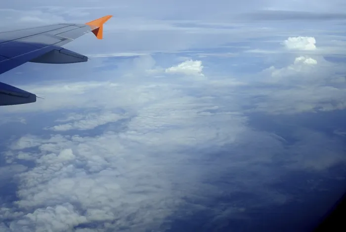 Framed Print : Aerial view of clouds and aircraft wing Framed Print : Aerial view of clouds and aircraft wing