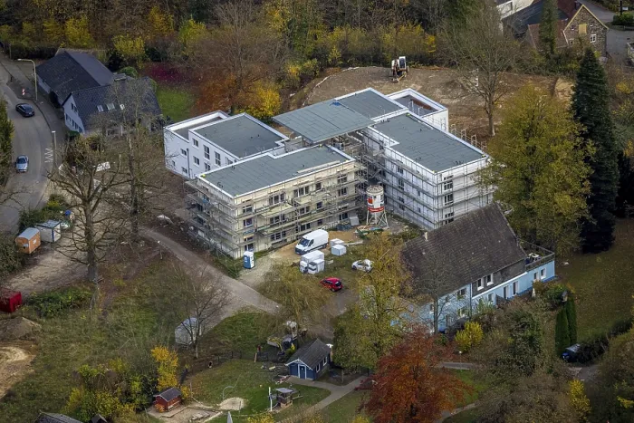 Framed Print : Aerial view, construction site with new apartment building Living for generations on RibbertstraBe next to