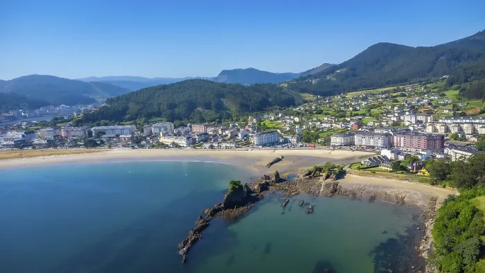 Framed Print : Aerial view of covas beach meeting the charming town of viveiro