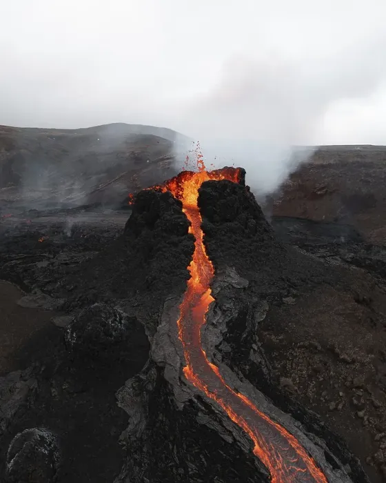 Framed Print : Aerial view, erupting volcano, crater with erupting lava and lava flow Framed Print : Aerial view, erupting volcano, crater with erupting lava and lava flow