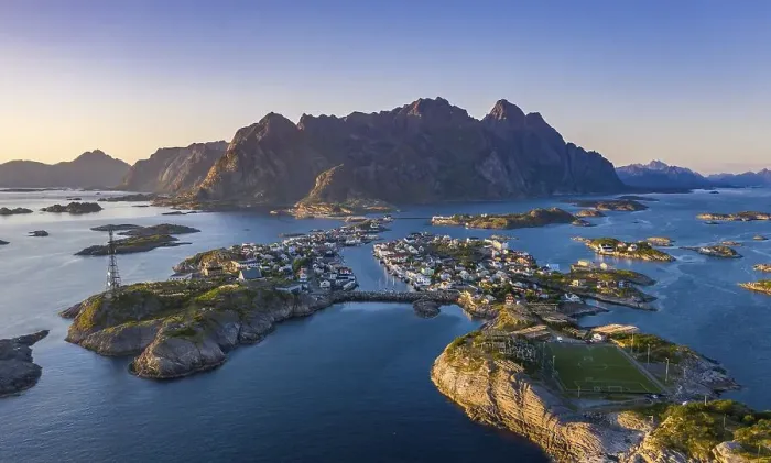 Framed Print : Aerial view, evening sun over Henningsvaer with football stadium
