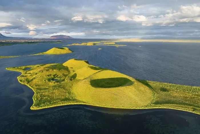 Framed Print : Aerial view of green volcanic island