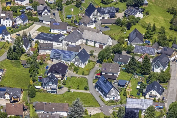 Framed Print : Aerial view, half-timbered houses with solar roof in the centre of Ostentrop
