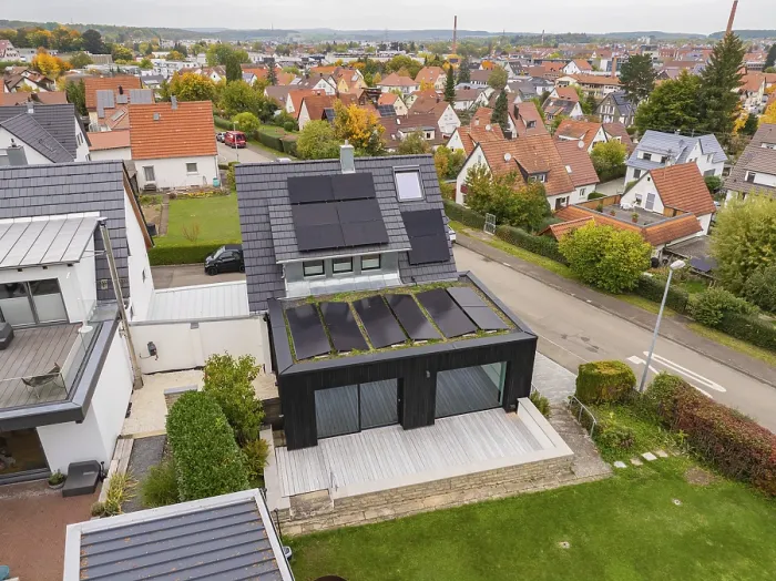 Framed Print : Aerial view of a house with solar system in a quiet residential area Framed Print : Aerial view of a house with solar system in a quiet residential area