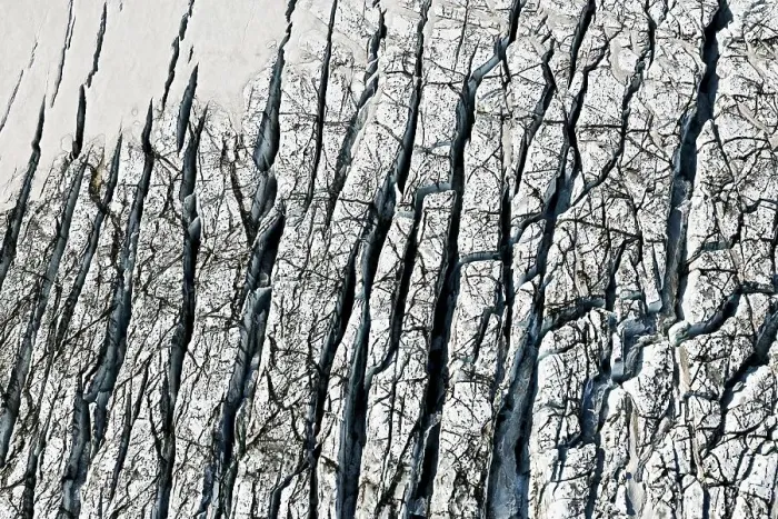 Framed Print : Aerial view, ice crevices and structures of volcanic ash and black lava in the ice and snow of the Vatnajoekull glacier Framed Print : Aerial view, ice crevices and structures of volcanic ash and black lava in the ice and snow of the Vatnajoekull glacier