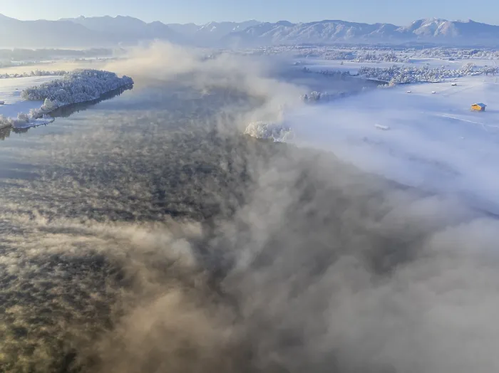 Framed Print : Aerial view of a lake in front of mountains