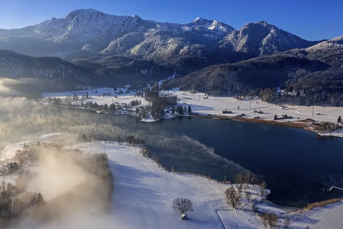 Framed Print : Aerial view of a lake in front of mountains in winter Framed Print : Aerial view of a lake in front of mountains in winter