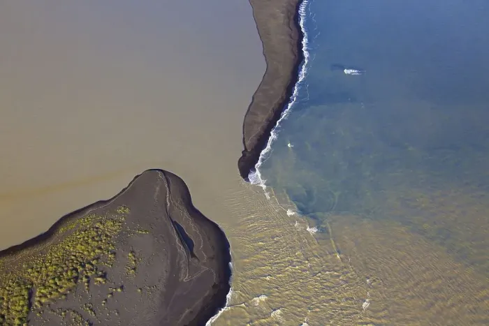 Framed Print : Aerial view over Landeyjarsandur showing beach with black volcanic sand
