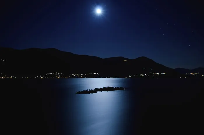 Framed Print : Aerial View with Moon Light Reflected over an Alpine Lake Maggiore with Brissago Islands