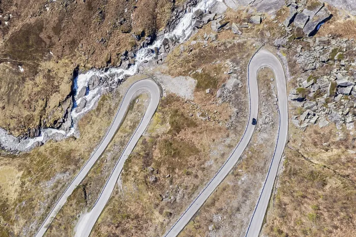 Framed Print : Aerial view of mountain pass road over the Vikafjell