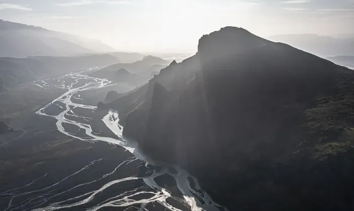 Framed Print : Aerial view, panorama, mountains and glacier river in a mountain valley Framed Print : Aerial view, panorama, mountains and glacier river in a mountain valley