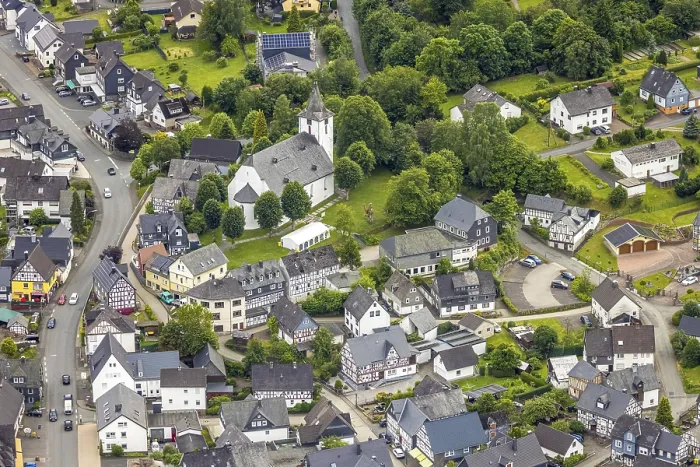 Framed Print : Aerial view, protestant church and half-timbered houses Framed Print : Aerial view, protestant church and half-timbered houses