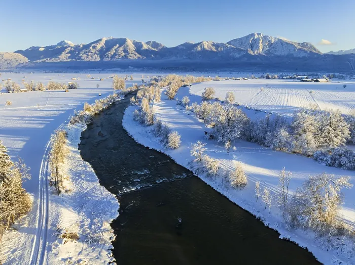 Framed Print : Aerial view of a river in front of mountains