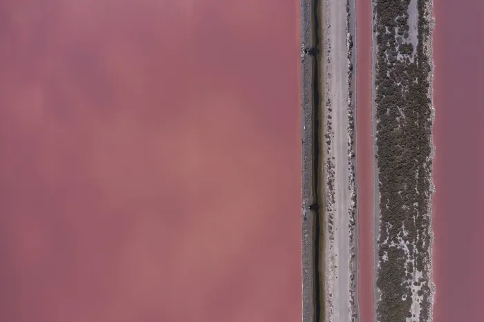 Framed Print : Aerial view of a salt works with road