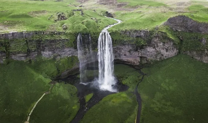 Framed Print : Aerial view, Seljalandsfoss waterfall falls from high cliff Framed Print : Aerial view, Seljalandsfoss waterfall falls from high cliff