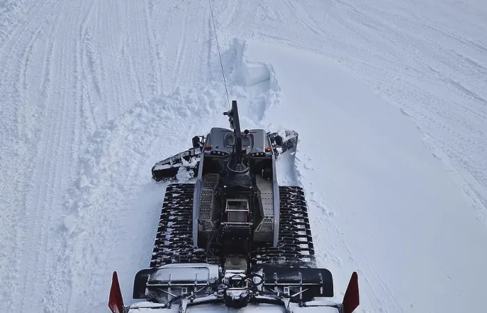 Framed Print : Aerial view of a snowcat working as leveling the snowdrifts on the slopes at Bansko ski resort in Bulgaria Framed Print : Aerial view of a snowcat working as leveling the snowdrifts on the slopes at Bansko ski resort in Bulgaria
