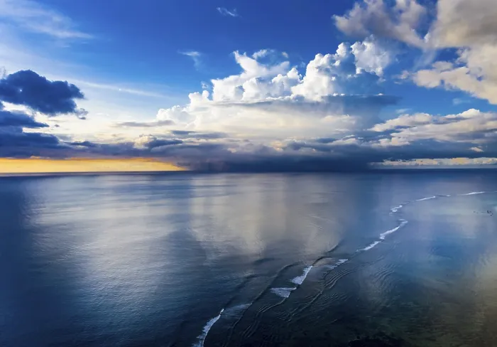 Framed Print : Aerial view, sunset, rain cloud over the sea on the horizon Framed Print : Aerial view, sunset, rain cloud over the sea on the horizon