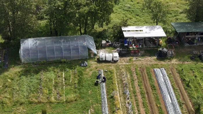 Framed Print : Aerial View of a Sustainable Farm with a Greenhouse Barn Structure