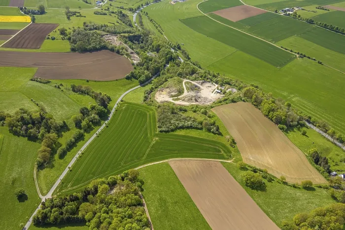 Framed Print : Aerial view, Wulfte quarry surrounded by meadows and fields