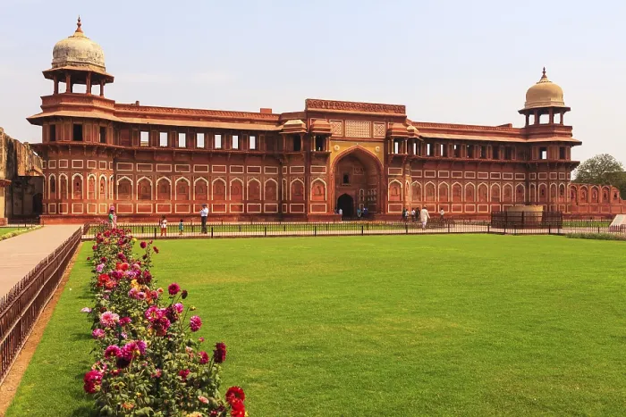 Framed Print : AGRA, INDIA - March 24, 2013 : Unidentified people who visits the castle walk in the Garden of the Palace