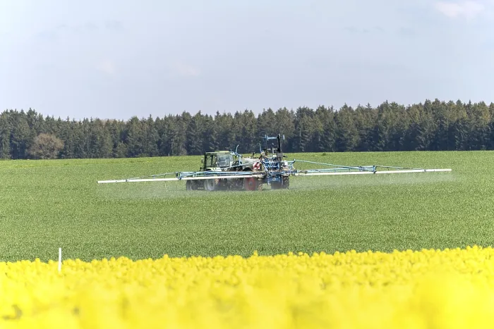 Framed Print : Agriculture, pesticide being sprayed on a field in spring Framed Print : Agriculture, pesticide being sprayed on a field in spring