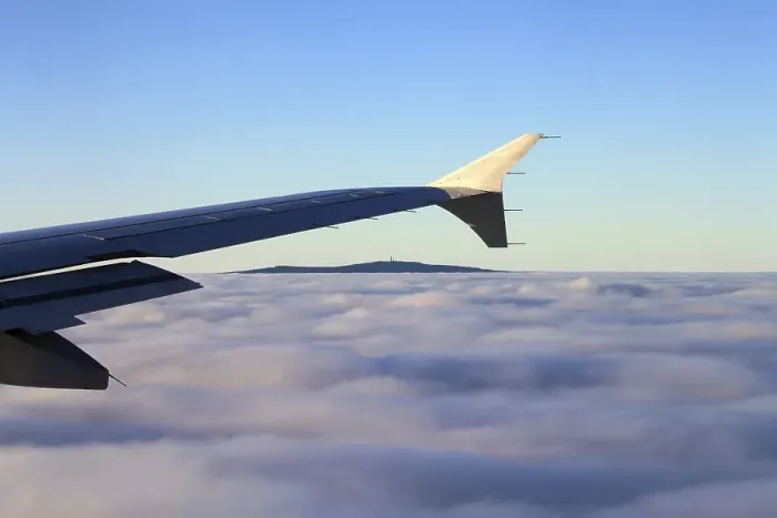 Framed Print : Aircraft wing, inversion weather situation
