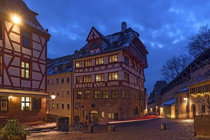 Framed Print : Albrecht Duerer House in evening illumination
