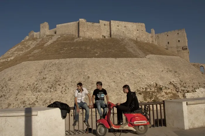 Framed Print : Aleppo, Syria. November 4th 2010 Syrian youths in front of the Citadel of Aleppo