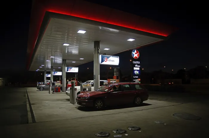 Framed Print : An all-night service station attracts customers in Christchurch
