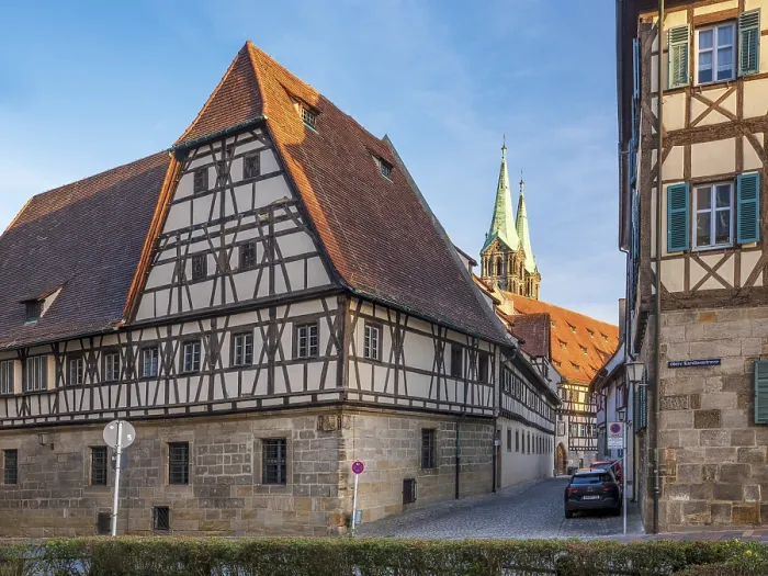 Framed Print : Alley with half-timbered houses and cobblestones