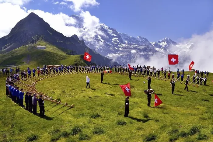 Framed Print : Alphorn blowers and flag throwers