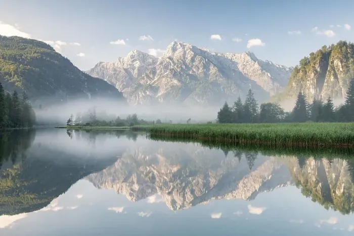 Framed Print : Alpine lake with reflection, fog atmosphere
