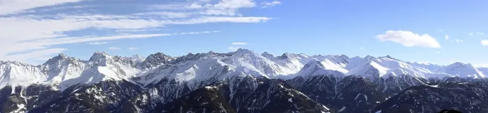 Framed Print : Alpine panorama with snow-covered mountain peaks in winter