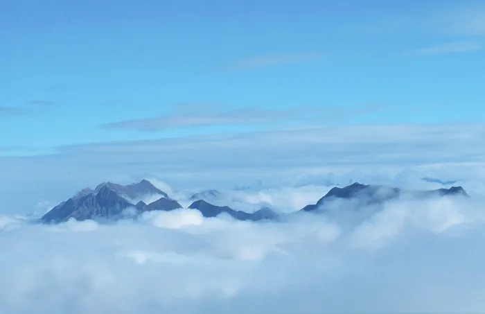 Framed Print : Alpine peaks above clouds, Bernese Oberland (sky) (Europe) (landscapes) (mountains) (landscape) (horizontal)