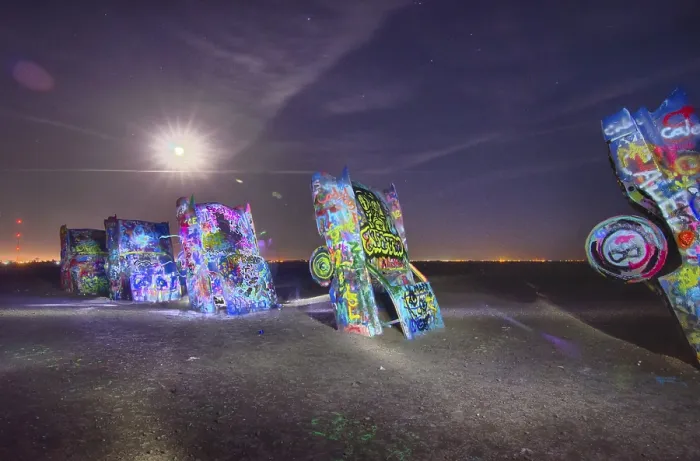 Framed Print : AMARILLO, TEXAS - April 2015: Famous art installation Cadillac Ranch at night
