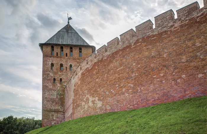 Framed Print : Ancient brick fortress wall and watch tower of the Novgorod Kremlin Framed Print : Ancient brick fortress wall and watch tower of the Novgorod Kremlin